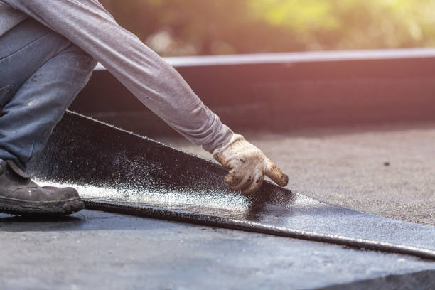 Professional Basement Waterproofing technician working in New Trenton, IN
